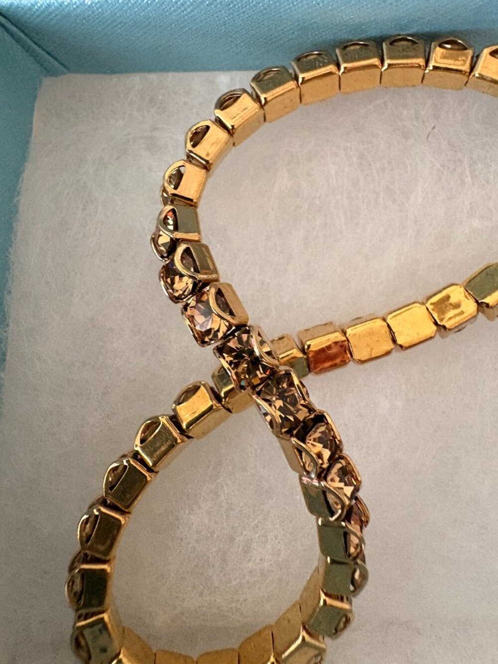 Cute gold stretch bracelet by Touchstone Crystal, new in box